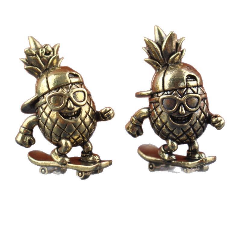 Cute Brass Pineapple Skateboarding Figurine Vintage Cartoon Design Small Statue for Desktop Car Dashboard Decor Creative Gift for Teens