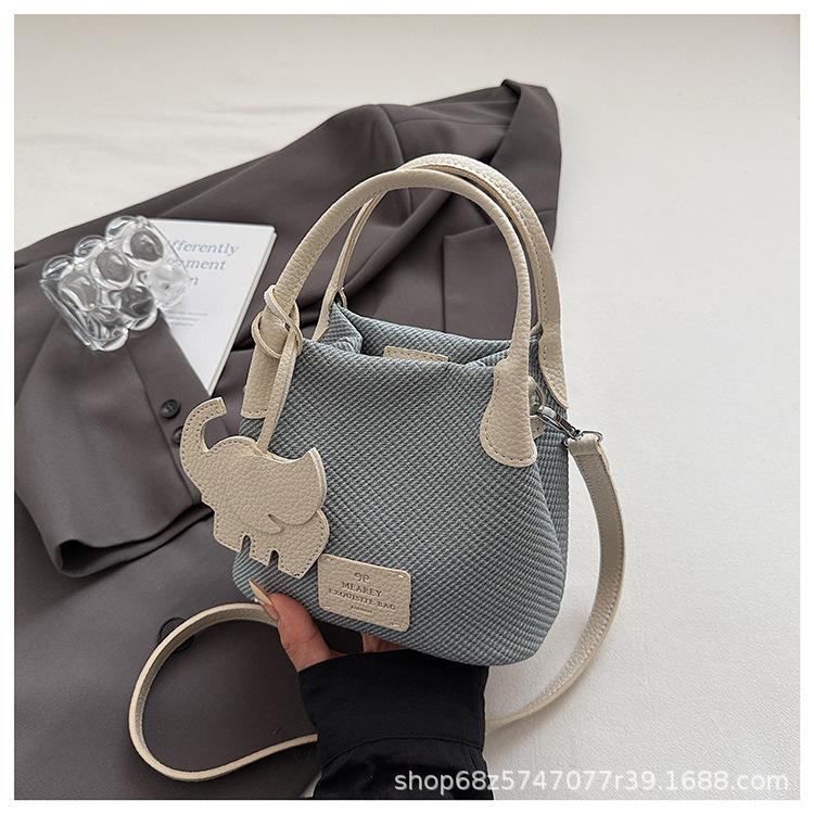 Korean version ins trendy fashion bucket bag women's 2025 spring simple and versatile shoulder bag high-end casual women's bag