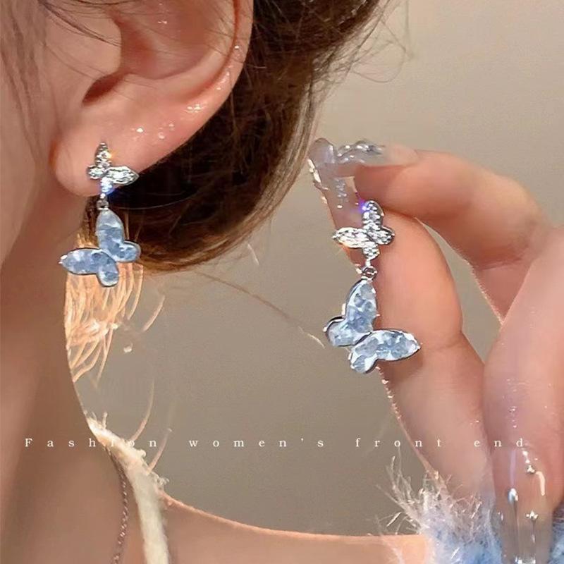 Silver needle asymmetrical blue butterfly tassel earrings women's high-end temperament long pearl stud earrings