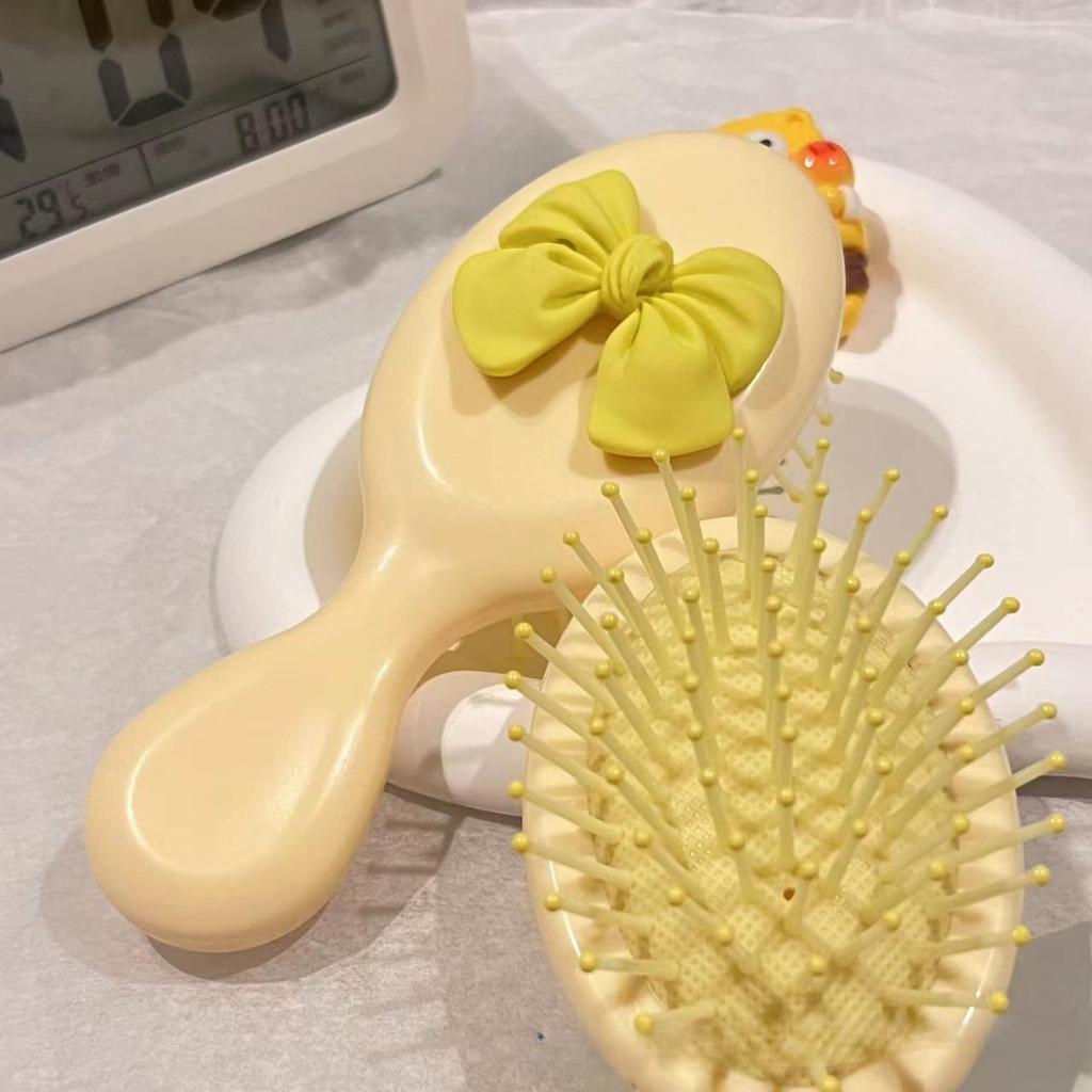 Милая мультяшная расческа с бантом на ручке для массажа кожи головы, переносная пластиковая воздушная подушка, маленькая расческа, щетка для волос с бантом, милая милая расческа