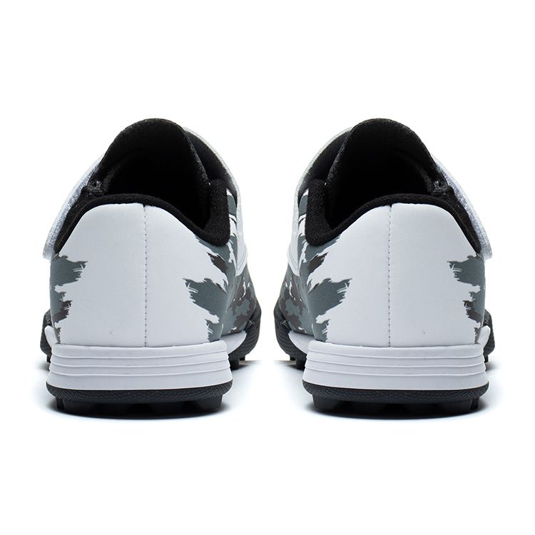 Подкладка Синтетическая кожа Удобные профессиональные устойчивые низкие детские футбольные бутсы Детские футбольные бутсы Черные белые ASTT008-4