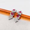 Gessen Jewelry: Элегантный набор: серьги, кольцо и подвеска с красными цирконами