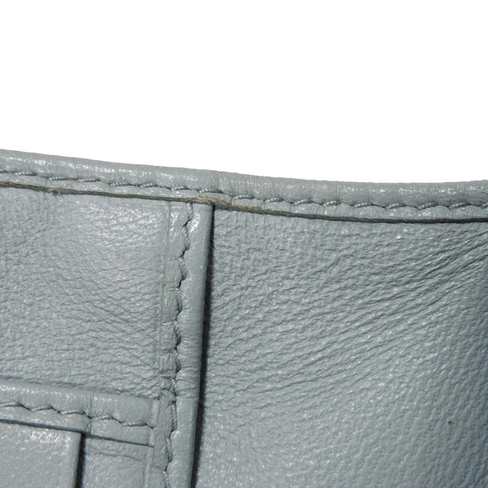 Б/у Компактный кошелек на молнии с узором Matelasse (5ML002 N88 F0012 7941) с RFID и кожей ягненка. Металлический логотип. Женский Cielo из Японии