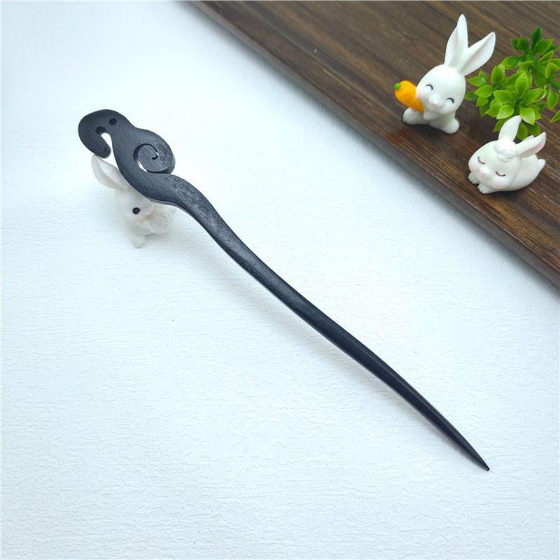 Элегантная шпилька из черного дерева: Современная простота в сочетании с древним китайским стилем