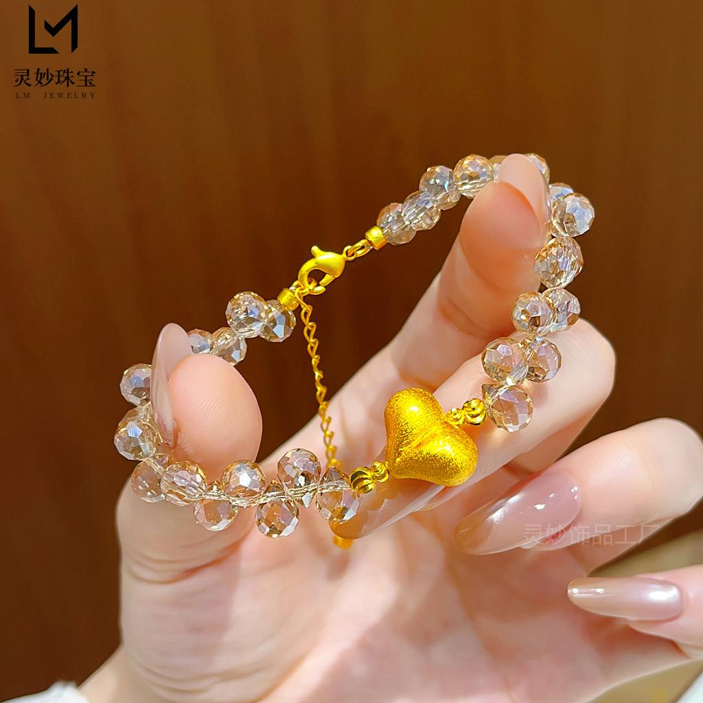 Shiny gold-plated peach champagne water drop bracelet with frosted heart-shaped lucky beads, exquisite and stylish, a gift for a girlfriend