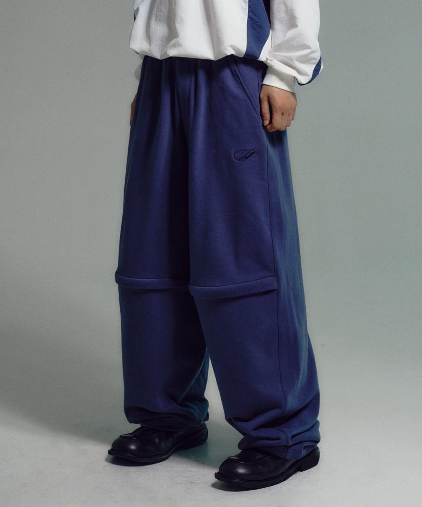 TRAVEL Open-Knee Sweat Balloon Pants Dark Blue