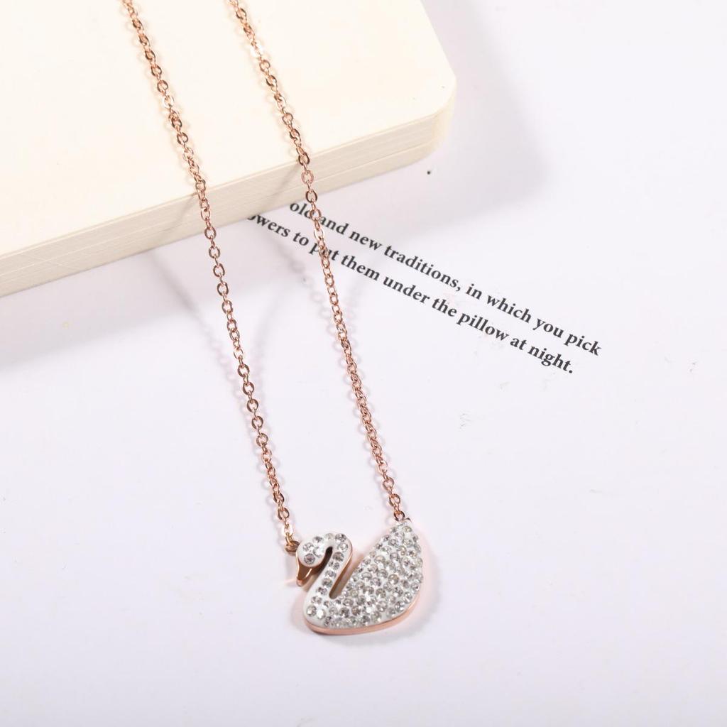 Ожерелье-подвеска "Сглаз и Лебедь" - Женская деликатная цепочка на ключицу с бьющимся сердцем.