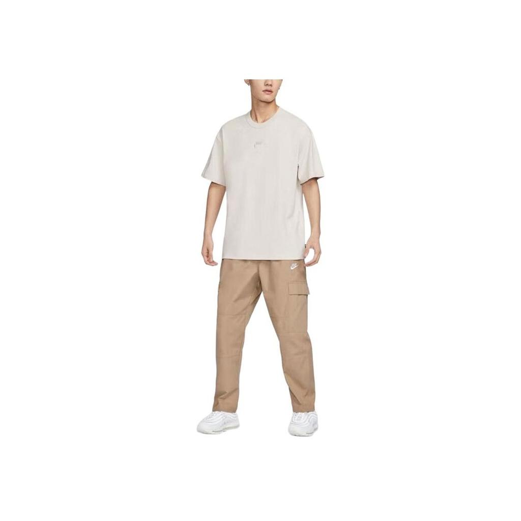 Nike Спортивная одежда Premium Essentials Свободная удобная футболка с круглым вырезом и короткими рукавами и заниженными плечами Мужские топы белого цвета DO7393-104