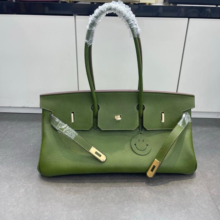 Cross-border trend bag short version oversized portable shoulder bag TOGO first layer cowhide large capacity giant pack