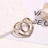 Металлическая пуговица в форме сердца с жемчужиной для фиксации низа футболки