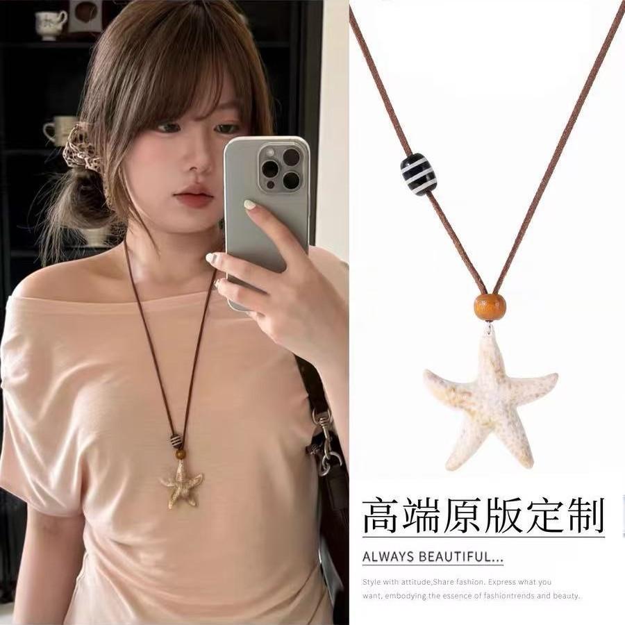 Summer vacation style starfish pendant necklace women's sweet and cute beaded star sweater chain new versatile accessories