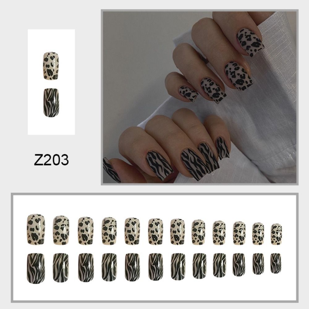 Линии накладных ногтей Нажмите на ногти Асимметричный леопардовый летний пляж Накладные ногти Длинные квадратные французские ногти