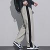 Мужские повседневные брюки широкого кроя с контрастными черными и белыми вставками и шнурком - модная, универсальная спортивная одежда