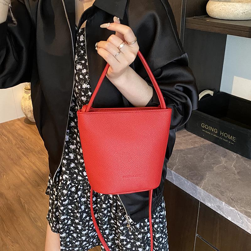 Простая и модная женская сумка-ведро для ношения в руке, новая коллекция весна-лето 2025, модная универсальная наплечная сумка, нишевая высококлассная женская сумка