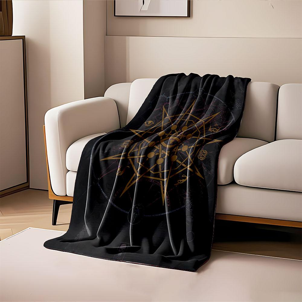 A golden star-shaped geometric pattern with circles and an eye in the center. for all seasons blanket lunch break throw gift