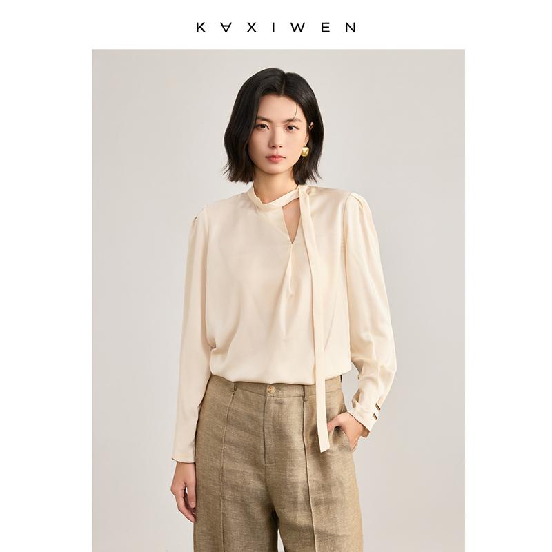 Qianqian grammar style irregular V-neck small shirt 2026 spring new commuting design sense ribbon hollow top for women