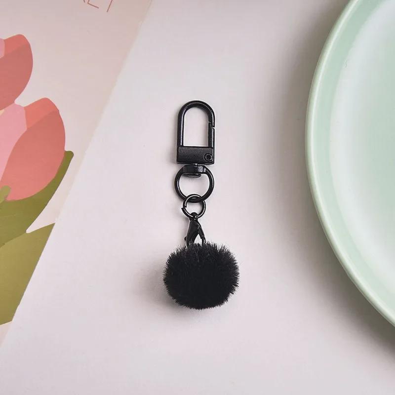 Брелок для ключей в виде разноцветного плюшевого шарика с молочным кулоном, абажуром в виде макарон и вращающейся пряжкой.