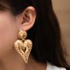 Металлические преувеличенные серьги-гвоздики в стиле wind темперамент индивидуальность полые большие серьги-сердца ретро нишевые высококачественные серьги