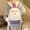 New Small Fresh Contrast Bag Light and Casual Outdoor Backpack High Capacity Backpack for Junior and Senior High School Students.