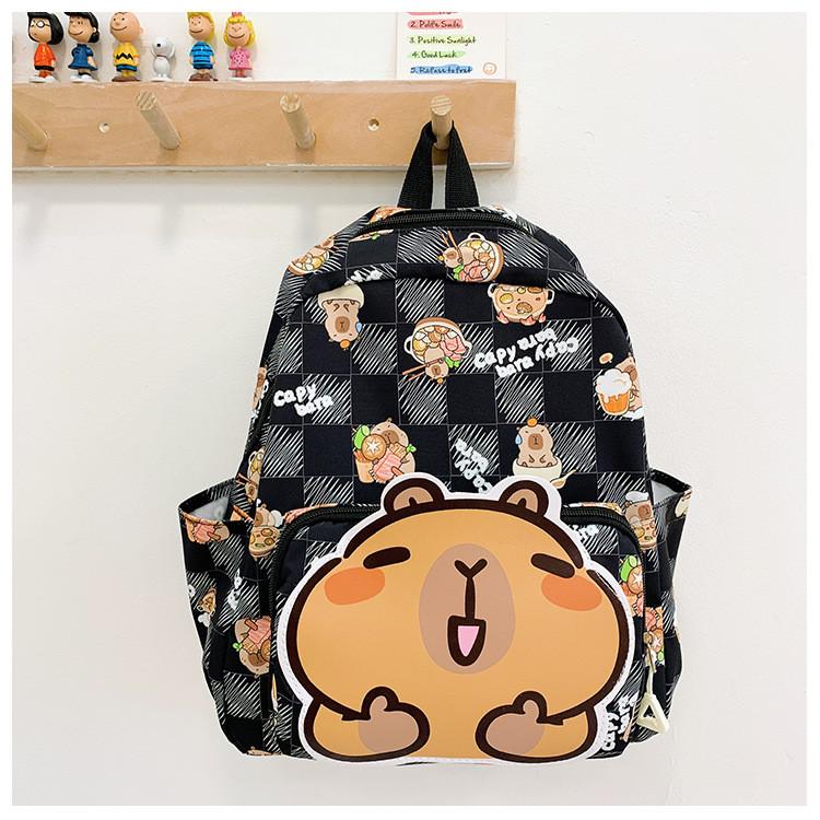 Capybara Cartoon Vibrant School Backpack For Children With Durable Nylon Material And Fun Design
