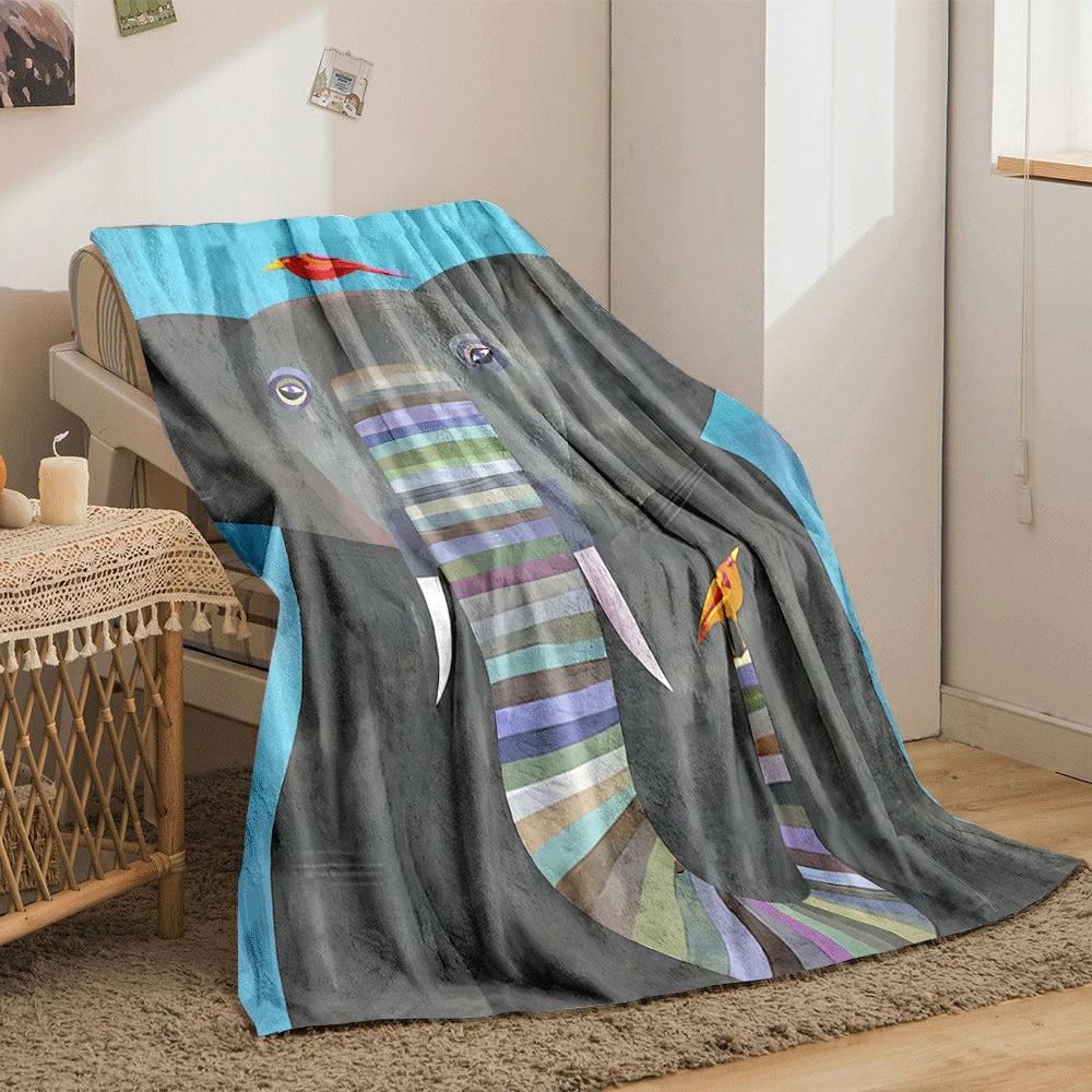 A gray elephant with a multicolored striped trunk and two vibrant birds. for all seasons blanket lunch break throw gift