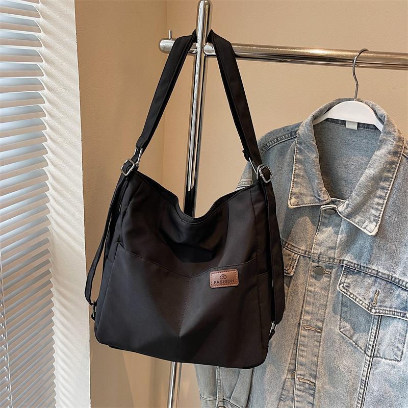 Повседневный наплечный рюкзак из ткани, текстурная сумка большой вместимости, женская новая парусиновая осенне-зимняя сумка-тоут для поездок на работу 2025