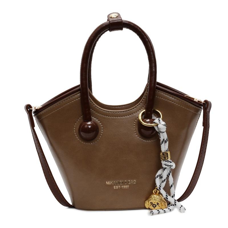 Корейская нишевая сумка женская 2025 новая весна и лето универсальная сумочка популярная одноплечевая сумка-мессенджер сумка-ведро