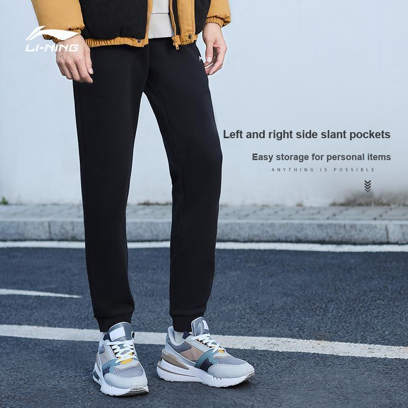 Мужские трикотажные спортивные штаны Li Ning Fitness Series с принтом логотипа и флисовой подкладкой, черные AKLTC13