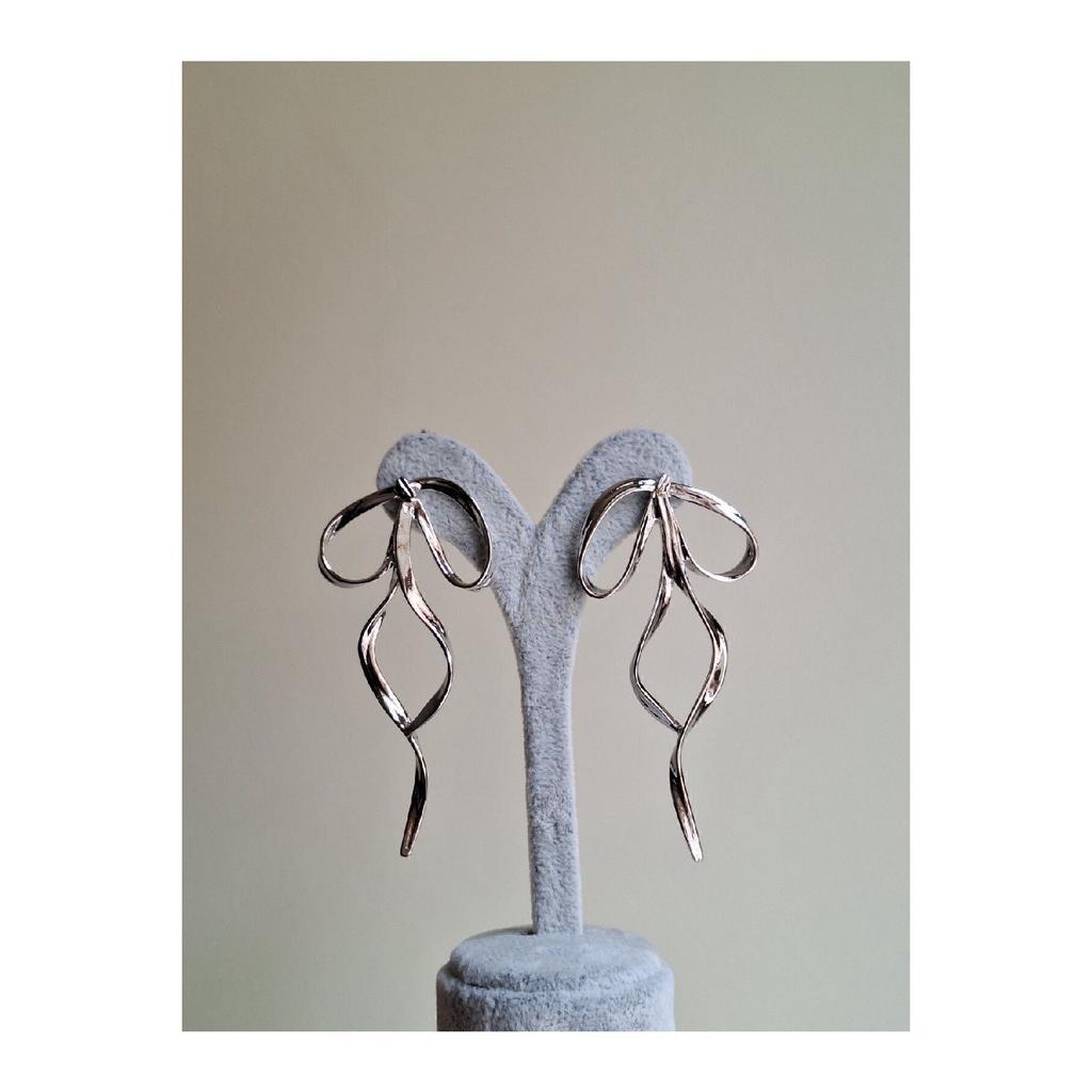 Стальная серьга-бантик, золото