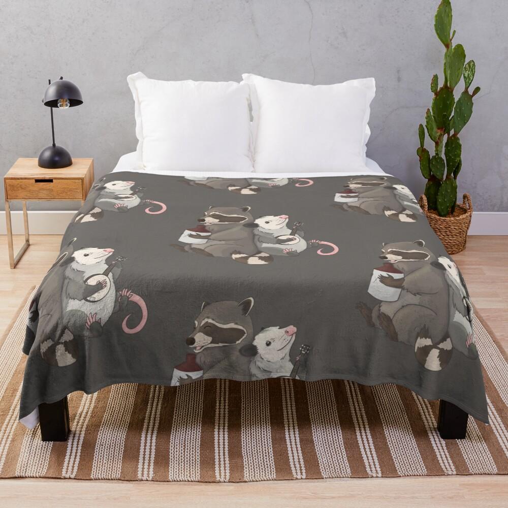 Opossum and a Racoon playing instruments Throw Blanket