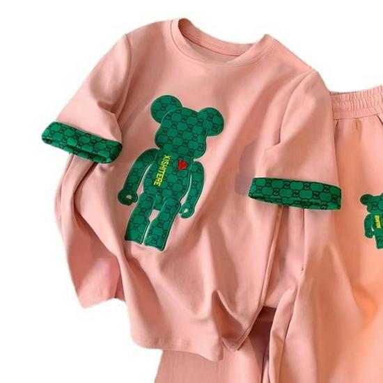 Лето 2024 г. Женский повседневный спортивный комплект из двух предметов: Модный топ с короткими рукавами, круглым вырезом и широкими брюками.