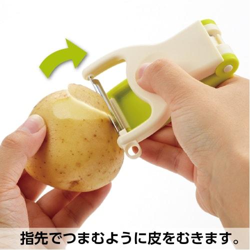 Овощечистка Akebono Sangyo, Зеленая, Сделано в Японии. Этот удобный пилер с зажимом и движением безопасно очищает круглые овощи.. Он имеет два режима: "Длинный овощ М"
