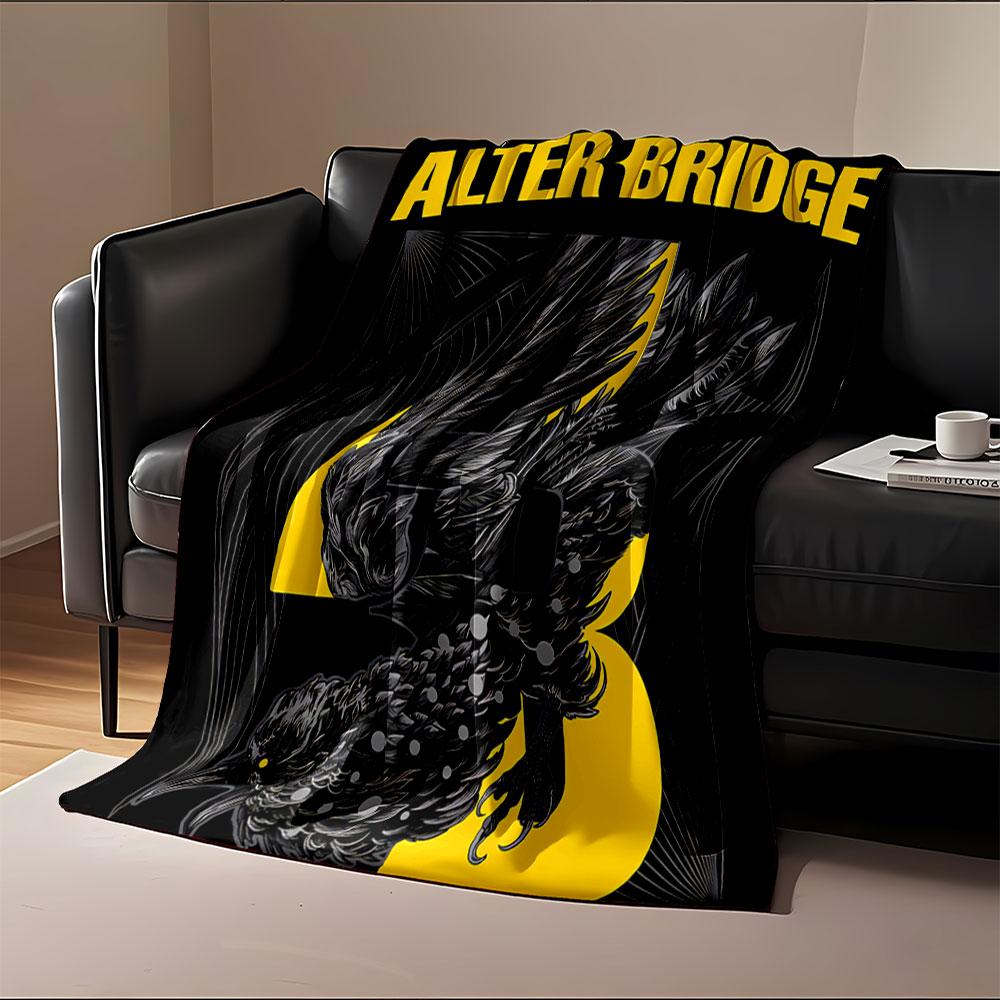 A stylized black bird entwined with yellow text and abstract line art. for all seasons blanket lunch break throw gift