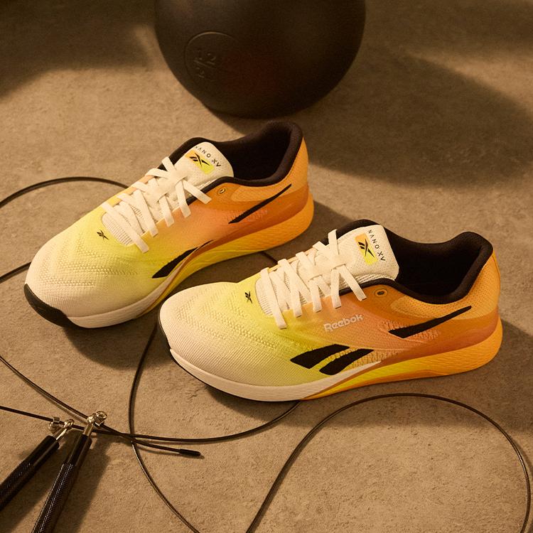 Reebok Кроссовки унисекс Nano X5 Chalk Black Electric Amber Желтый 100209367