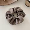 Satin-Feel Scrunchie: Versatile Luxury Hair Tie for Women, Elevates Style & Compliments Skin Tone.