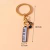 Креативный брелок для ключей с клавиатурой пианино, модный брелок золотого цвета, новый продукт, музыкальные брелки