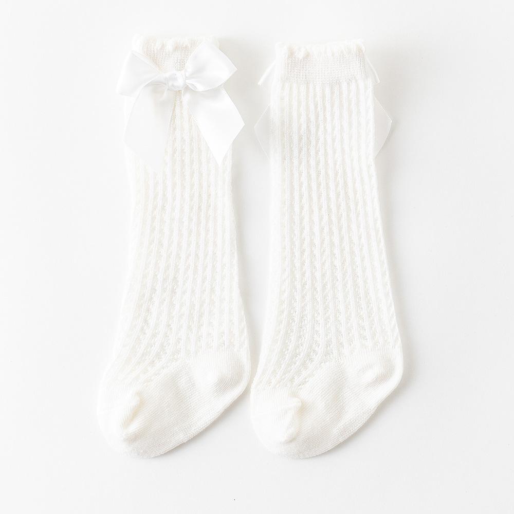 Летние носки для маленьких девочек, милые большие банты, мягкие хлопковые эластичные однотонные сетчатые носки для новорожденных, длинные носки до колена для маленьких девочек