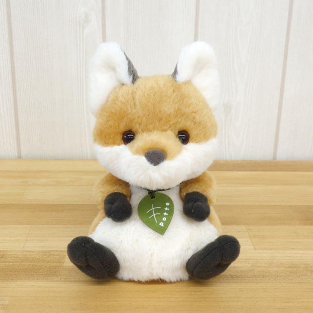 Чучело лисы в горшке