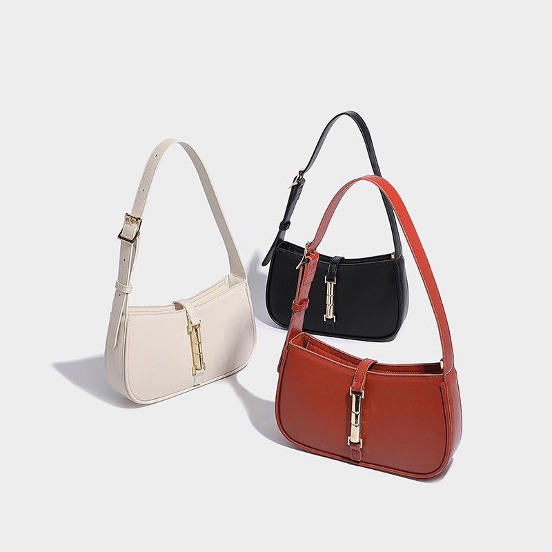 «Французские женские сумки подмышки из коллекции осень-зима 2023 года в нишевом дизайне высокого класса»: Модные сумки на одно плечо