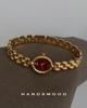New French Exquisite Temperament Gold Red Oval Small Dial Fashionable Niche Western-style Women's Quartz Watch