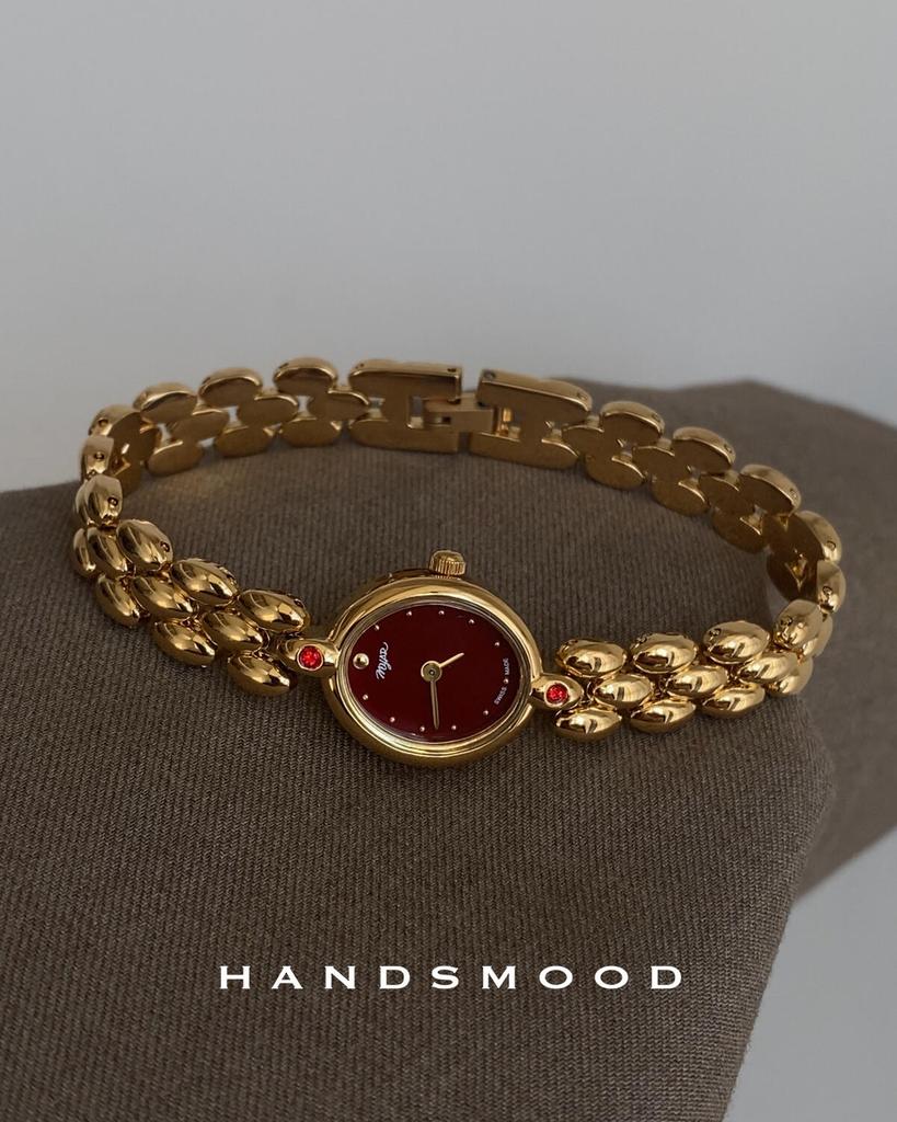 New French Exquisite Temperament Gold Red Oval Small Dial Fashionable Niche Western-style Women's Quartz Watch