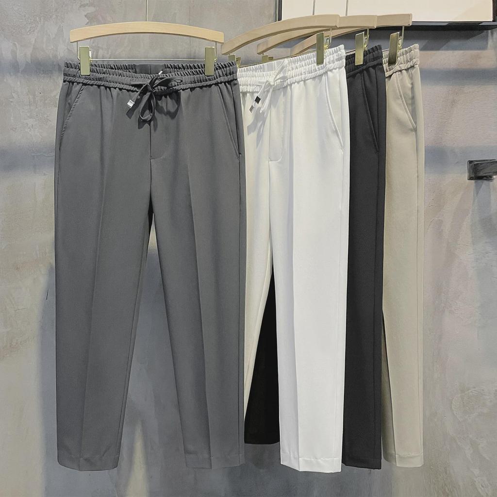 2024 Мужские повседневные брюки с эластичной талией в корейском стиле с девятью точками — ретро-тренд в британском стиле без утюга