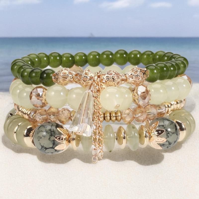 Шикарный женский браслет в стиле бохо с четырьмя слоями стеклянных бусин и кисточками