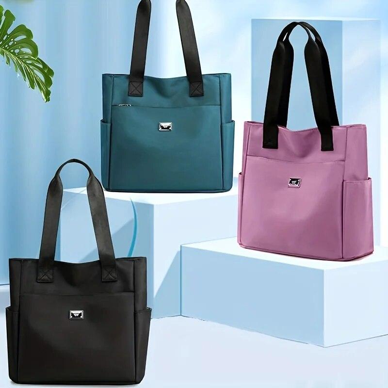 Прочная и легкая нейлоновая сумка-тоут идеально подходит для ежедневных поездок на работу.