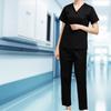 Удобный комплект медицинской одежды для женщин - топ и брюки.