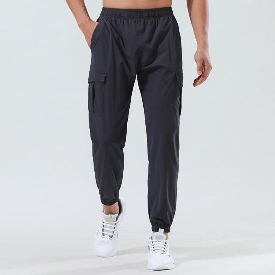 Men Pants Elastic Waist Quick-drying Loose Solid Color Pockets Stretchy Daily Wear Casual