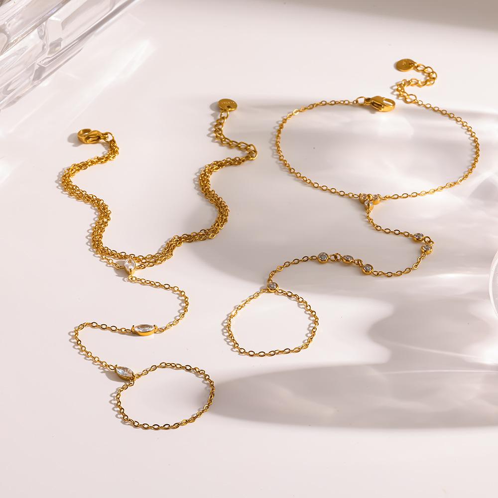 Hot Sale Niche Light Luxury Zircon Back Chain Plated 18K Gold Stainless Steel Integrated Finger Bracelet Color Retaining Jewelry