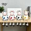 Cow Figurine Resin Statue, Cute Shelf Sitter with Dangling Rope Legs, Garden Decor for Patio Cartoon Farmhouse Animal Ornament Fence Railing, Planter,
