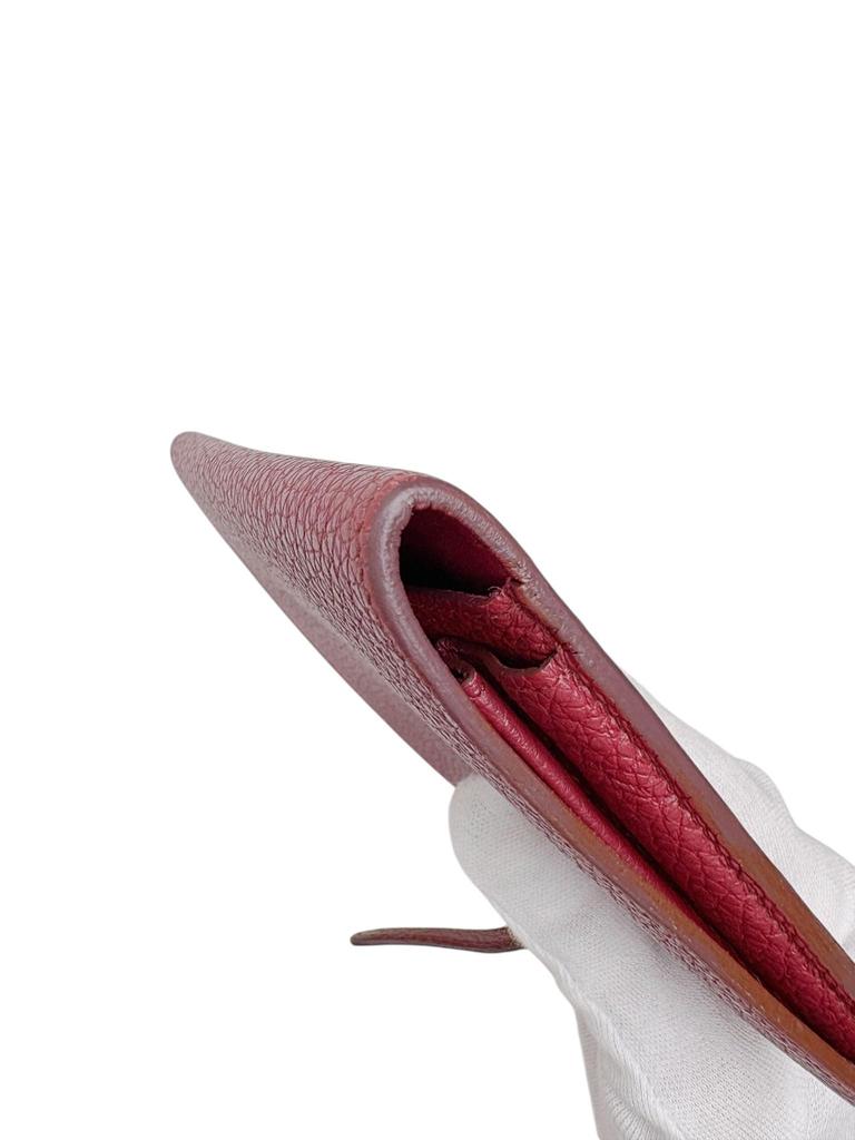 Б/у длинный кошелек Hermès Dogon GM цвета Wine Ruby, серебряная фурнитура