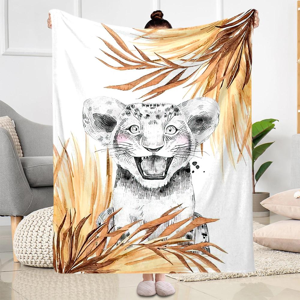 Lion Cub In Exotic Leaves Blankets are suitable for living rooms,making them an ideal choice for outdoor travel and gifts.